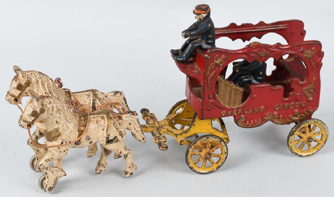 KENTON OVERLAND CIRCUS CALLIOPE WAGON: Nice original cast iron Horse Drawn Calliope Wagon. All original with no breaks. Comes with both original figures. Still has nice paint. 14" Very Good-Excellent