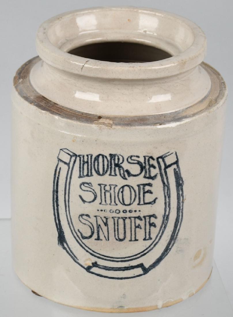 HORSE SHOE SNUFF STONEWARE TOBACCO JAR: Stoneware jar with blue lettering, Horse Shoe Snuff. Tobacco advertising piece, standing approximately 8.75" tall. Has minor factory imperfections. Marked on both sides. Excellent