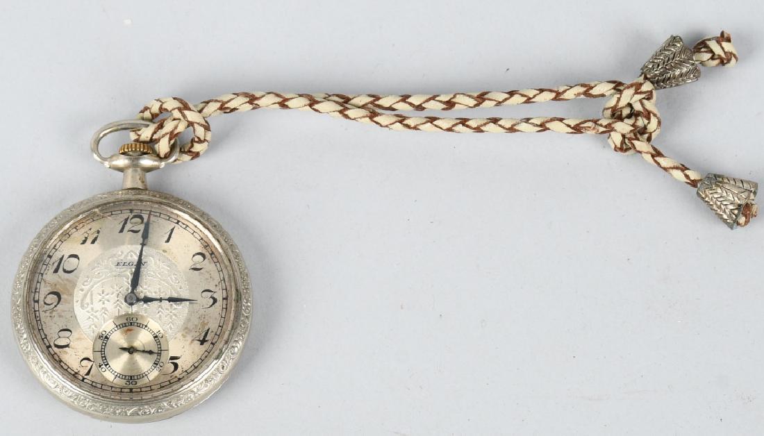 BUFFALO BILL CODY ANTIQUE POCKET WATCH: Antique Elgin Pocket watch monogrammed WFC. Oral history from consignor says this watch was found in the belongings of William Frederick Cody after his death. Watch has ornate face and is working. 2 1