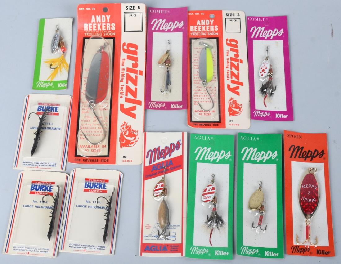 LOT 12 VINTAGE FISHING LURES IN ORIGINAL PACKAGING: 12 vintage fishing lures. Includes Burke, Mepps, Andy Reekers Trolling Spoons, and more. All sealed in original packaging. Mint