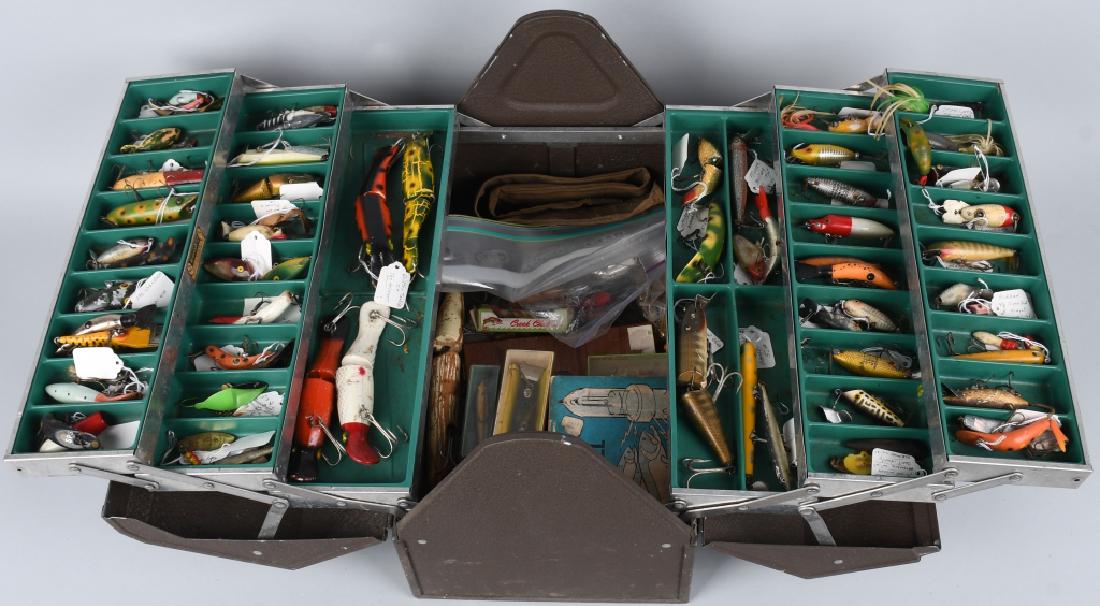 FISHING TACKLE BOX WITH 50+ VINTAGE LURES AND HOOK: Vintage fishing tackle box with over 50 lures, flies, etc. Includes Heddon, Mapps, Pflueger and more. Many segmented lures, ranging in size from 0.75" to 6". Excellent
