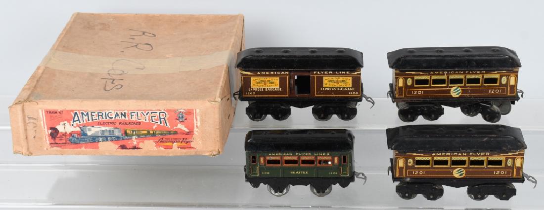4- PREWAR AMERICAN FLYER TRAIN CARS & BOX: Includes O- Gauge 2-1201 Passenger Cars, #1200 Express Baggage Car, and #1120 Seattle Passenger Car. All original. Comes with American Flyer Set Box. Excellent