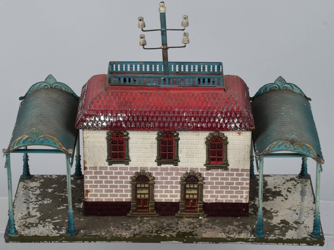BING GERMAN O SCALE PREWAR TRAIN STATION: Bing German train station o scale prewar. Has paint flaking around base. The roof has 2 holes on top possibly for lights. Has wear. Good condition