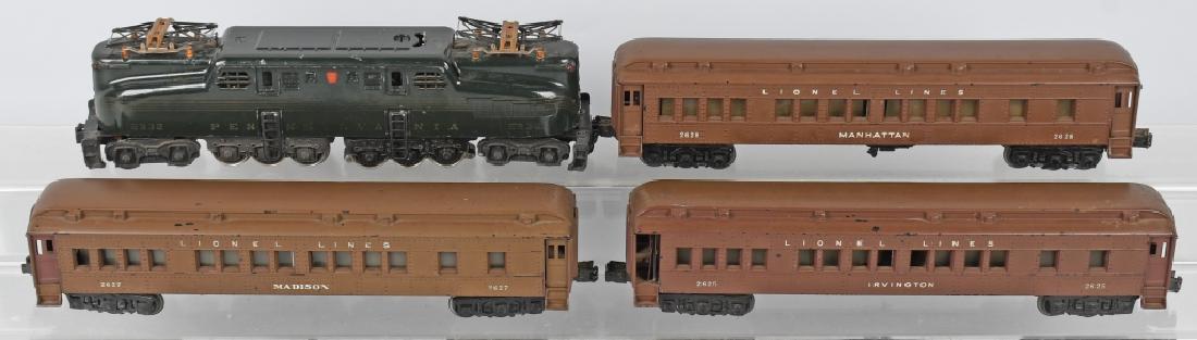LIONEL GG1 PASSENGER TRAIN SET: O gauge set with diecast metal No. 2332 Brunswick green 5 stripe locomotive, along with passenger cars no. 2625, 2627, and 2628. Locomotive is about 14" and the cars are about 14" long each. Light wea