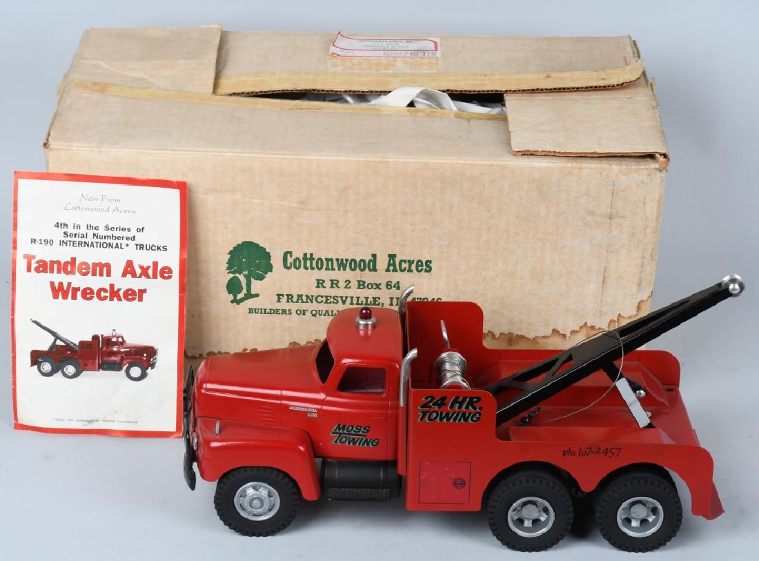 COTTONWOOD ACRES I.H. diecast TOW TRUCK w/ BOX: Truck is very detailed diecast metal. Measures15 1/2", Bed is loose. Includes paperwork and original box. Near Mint
