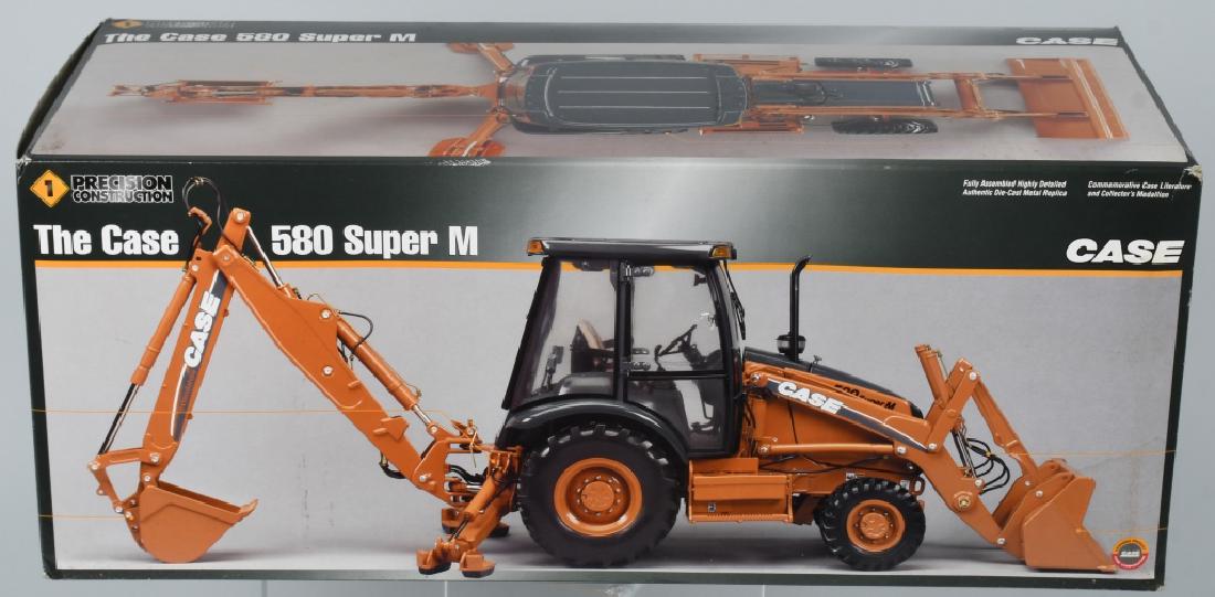 ERTL CASE 580 SUPER M 1:16 die cast TRACTOR w/ BOX: Highly detailed die cast tractor unplayed with in the original colorful box. Near Mint