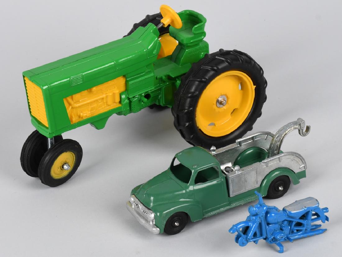 3 - VINTAGE HUBLEY die cast TOYS, TRACTOR & MORE: Lot includes 9 1/2" Tractor, 6 1/2" Wrecker Truck, and 4" BMW motorcycle. All have excellent original paint, and the BMW is missing wheels. Excellent