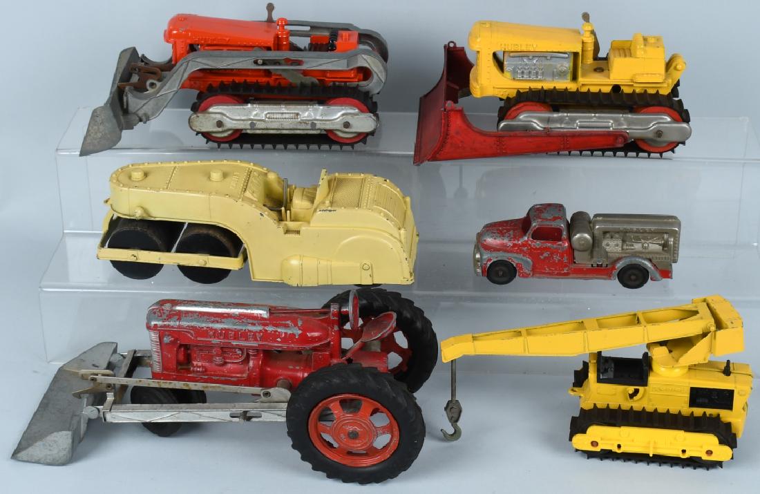 6 - VINTAGE HUBLEY die cast CONSTRUCTION TOYS: Lot includes 2 bulldozers, a tractor with front end loader, a road roller, an engine truck, and a crane on treads. The bulldozers have repaint the others appear original. Largest is 12". Good-Excellen