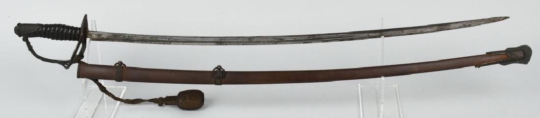 M 1872 AMES OFFICER CAVALRY SABER W/ ORIGINAL KNOT: Model 1872 Officer's Cavalry saber with the original sword knot. The ricasso is marked " L. Rachut Philadelphia Pa." Rachut was a retailer for Ames made swords. Sword is untouched. Sword knot is in ex
