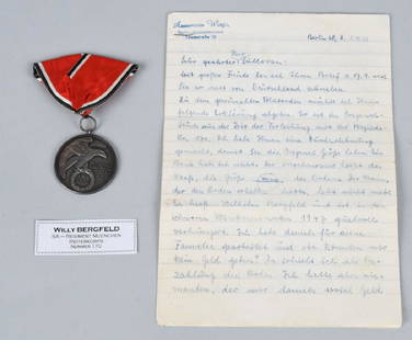 WWII NAZI GERMAN TYPE 1 BLOOD ORDER 990 #170: The first pattern Blood Order with the impressed recipients number ‘170,’ the ‘990’ silver content number and maker name Feuss, München, in relief. The Blood Order complete with its silk ribb