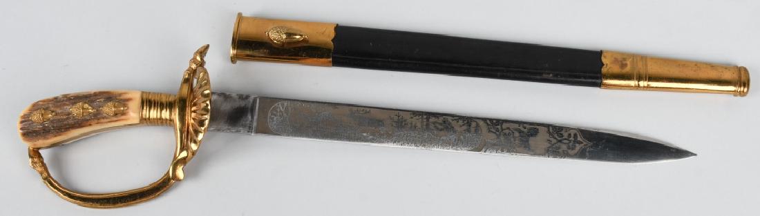 WWII NAZI GERMAN FORESTRY CUTLASS BY CARL EICKHORN: This example is constructed of fine quality brass mounts. It is the Model No. 1189 which appears in the Eickhorn catalogue. The “d” guard is of fairly smooth surfaces having lined borders and at t