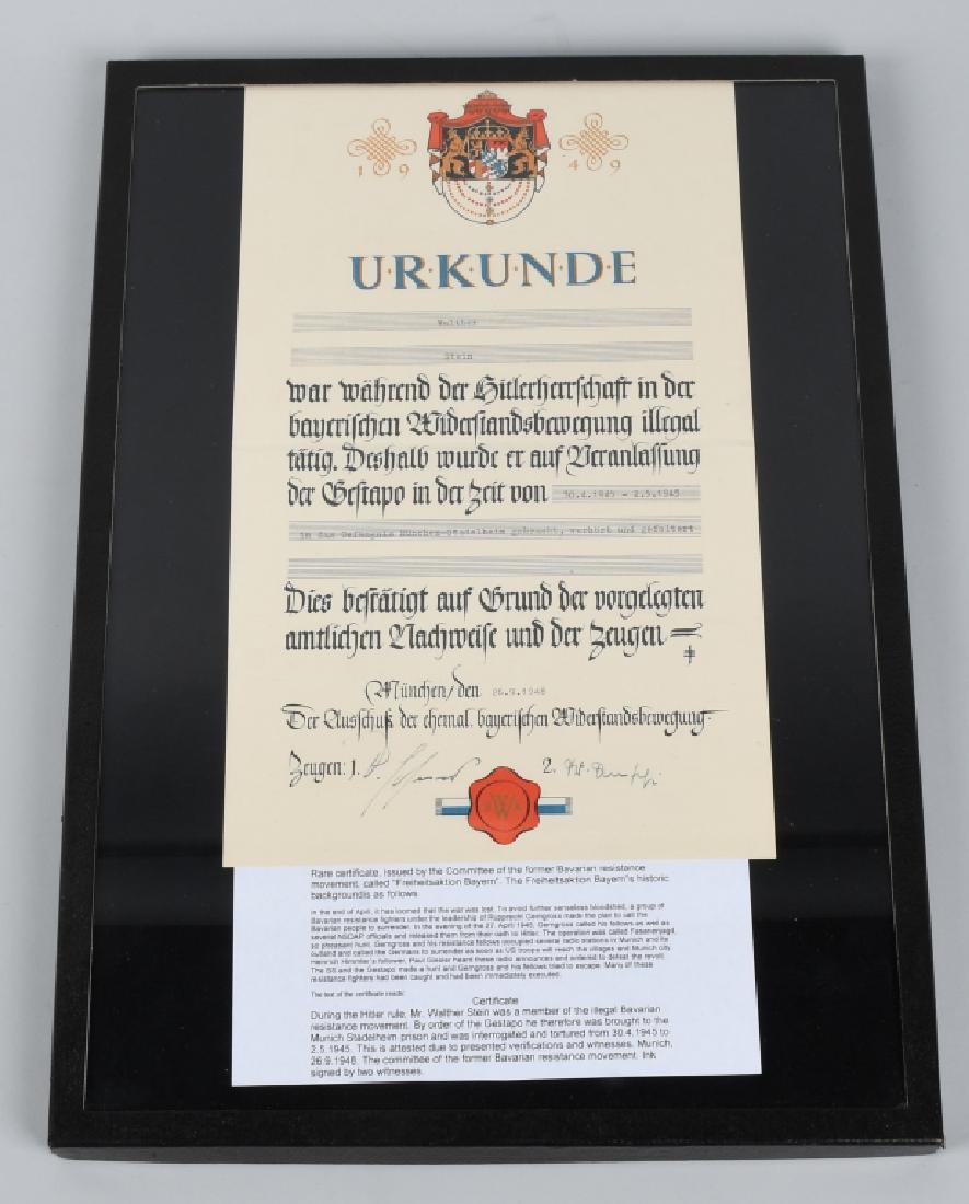 WWII POSTWAR BAVARIAN RESISTANCE CERTIFICATE: WWII - Post war Bavarian Resistance Certificate that is approximately 14 1/2" x 8 3/4" on cardstock paper and dated 1948. English translation of the German text reads: "CERTIFICATE. During the Hitler 