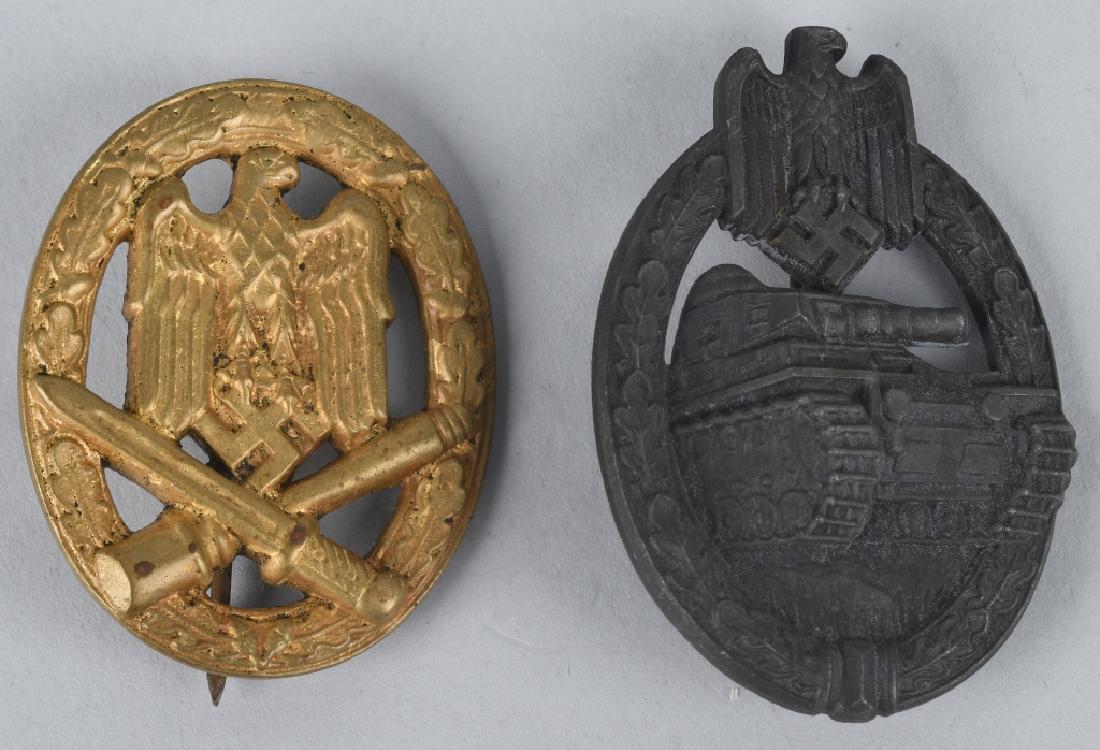 WWII NAZI GERMAN PANZER & GENERAL ASSAULT BADGES: Lot of two Die struck solid backed zinc award. The nicely detailed badge features a cut-out high relief Wehrmacht styled eagle with down-swept wings positioned above a crossed bayonet and stick grenad