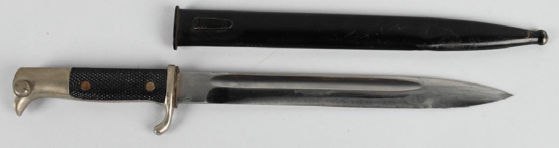 WWII NAZI GERMAN DRESS K98 BULLET STRUCK BAYONET: Roughly 24cm long nickel/silver plated drop forged steel construction blade with wide fullers to each side. The blade is still quite clean and bright. The ricasso is well marked with impressed manufac