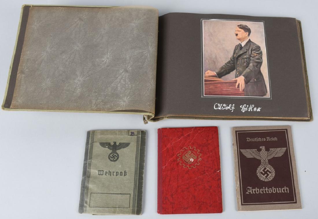 WWII NAZI GERMAN ARMY PHOTO ALBUM WITH WEHRPASS: Photo album with approximately 55 photos starting with his service in the RAD and ending up in the Wehrmacht. There is a fantastic image of his wearing a Panzer wrapper with his overseas cap. Along wi