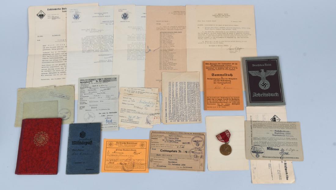 WWII US GERMAN NAZI DEFECTOR'S PAPERWORK GROUP: This is a fascinating grouping of paperwork that contains a mix of Third Reich and American military documents all named to the same soldier Kurt Kinne Army Serial Number #32448968. He received the Ar
