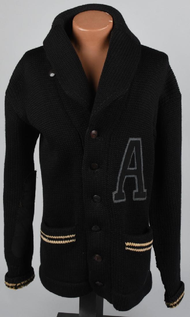 WWII US MILITARY ACADEMY WEST POINT CADET SWEATER: WWII era West Point cadet sweater. Has seven buttons up the right side, reinforced elbows, "A" letterman's letter machine-sewn to left chest, white lines at cuffs, and original "Birdsall Brothers Co. 