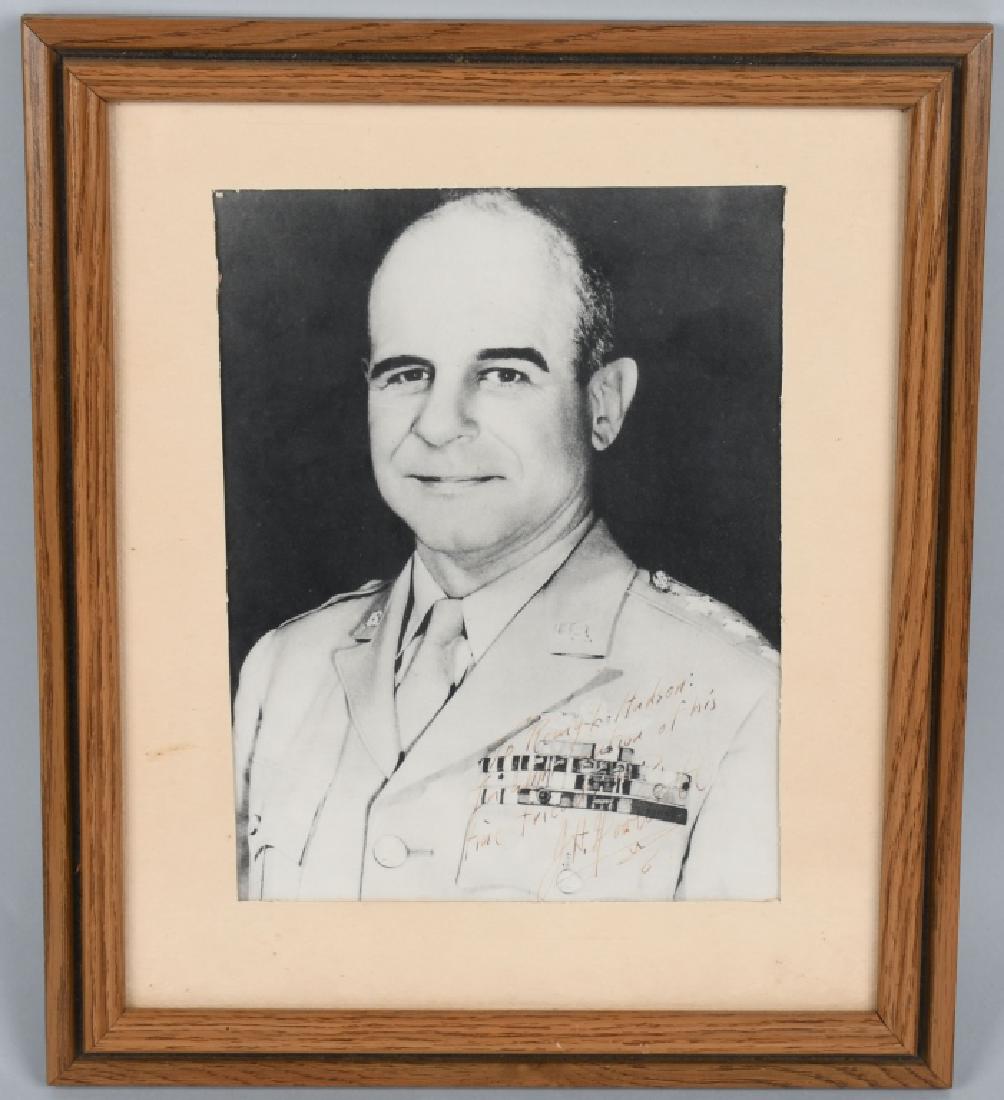 SIGNED PHOTO OF JIMMY DOOLITTLE, GENERAL, MOH: 7.5" x 9" black and white photo of General James H. "Jimmy" Doolittle, inscribed in ballpoint pent, "To Remy L. Hudson In appreciation of his fine friendship. J. H. Doolittle." Photo is matted and fra