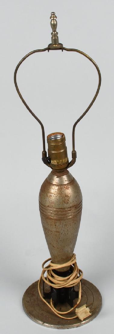 WWII TRENCH ART 60mm MORTAR LAMP: 23.25" tall trench art lamp made from a 60mm mortar *(inert)* and an artillery shell base. Some age wear, but displays well and a unique piece of World War II era trench art. Very Good