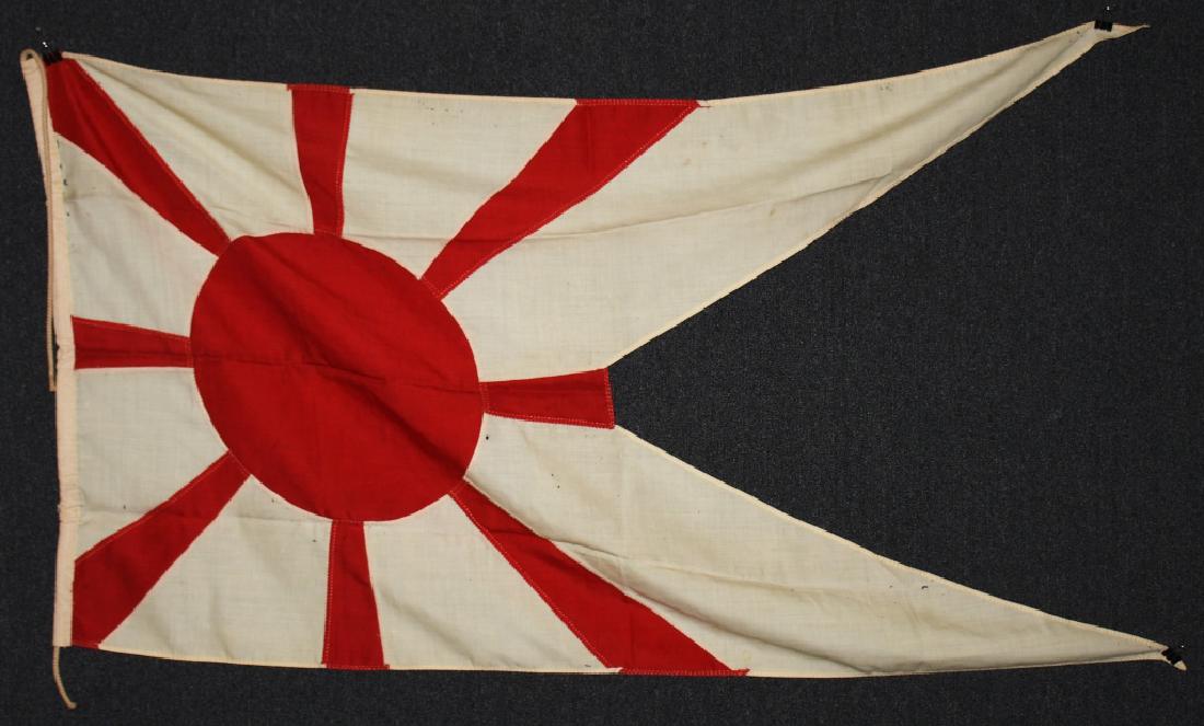 WWII JAPANESE NAVY COMMODORE RANK FLAG: Wool multi-piece pennant which measures 33" X 57", heavy cotton heading with braided rope running through it, looped at both ends. The pennant exhibits some scattered mothing but nothing distracting. 