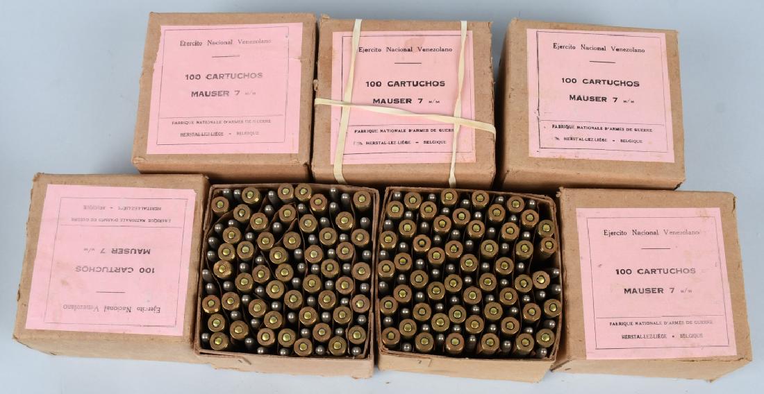 500 ROUNDS VENEZUELAN 7mm MAUSER RIFLE AMMUNITION: 5 original FN Venezuelan military boxes, dated 1936. Mostly full, each 100 Round box has the original paper tag. Approximately 495-500 rounds in total. Near Mint