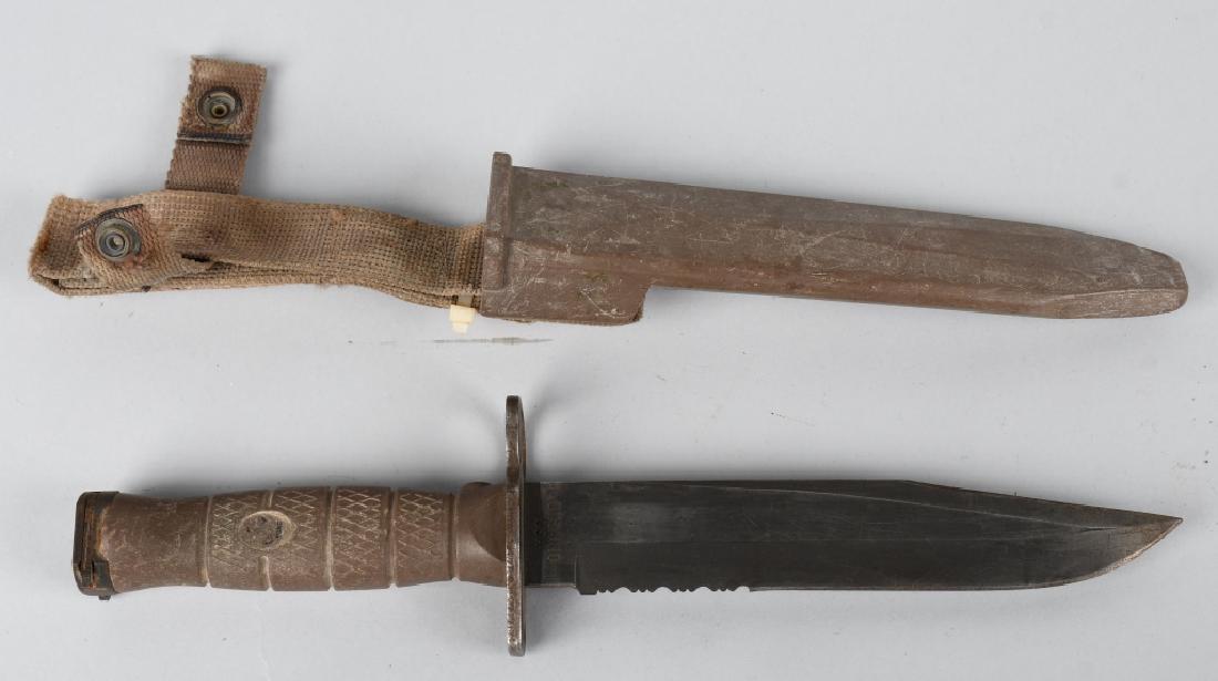 ONTARIO USMC COMBAT KNIFE BAYONET AND SCABBARD: 7.75" blade, 13" overall length combat knife by Ontario - this is a multipurpose bayonet adopted by the US Marine Corps early in the 2000s which has seen service in Iraq and Afghanistan. This example 