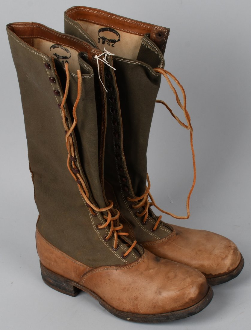 WWII NAZI GERMAN DAK AFRIKA KORPS HIGH BOOTS: Hobnail boots with reinforced heels, OD Green canvas uppers, 5 eyelets at the ankle and 12 hooks up the calf. Double-line stitching at the leather heels and toes. Bottoms have toe and heel irons. 25 H