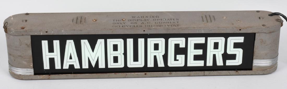1940s HAMBURGER LIGHT-UP SIGN: Great 1940s Hamburger Light-Up Sign. Reverse painted glass with Art Deco looking metal case. Works well and lights up green. Looks to have replaced cord. 26 1/2" Excellent