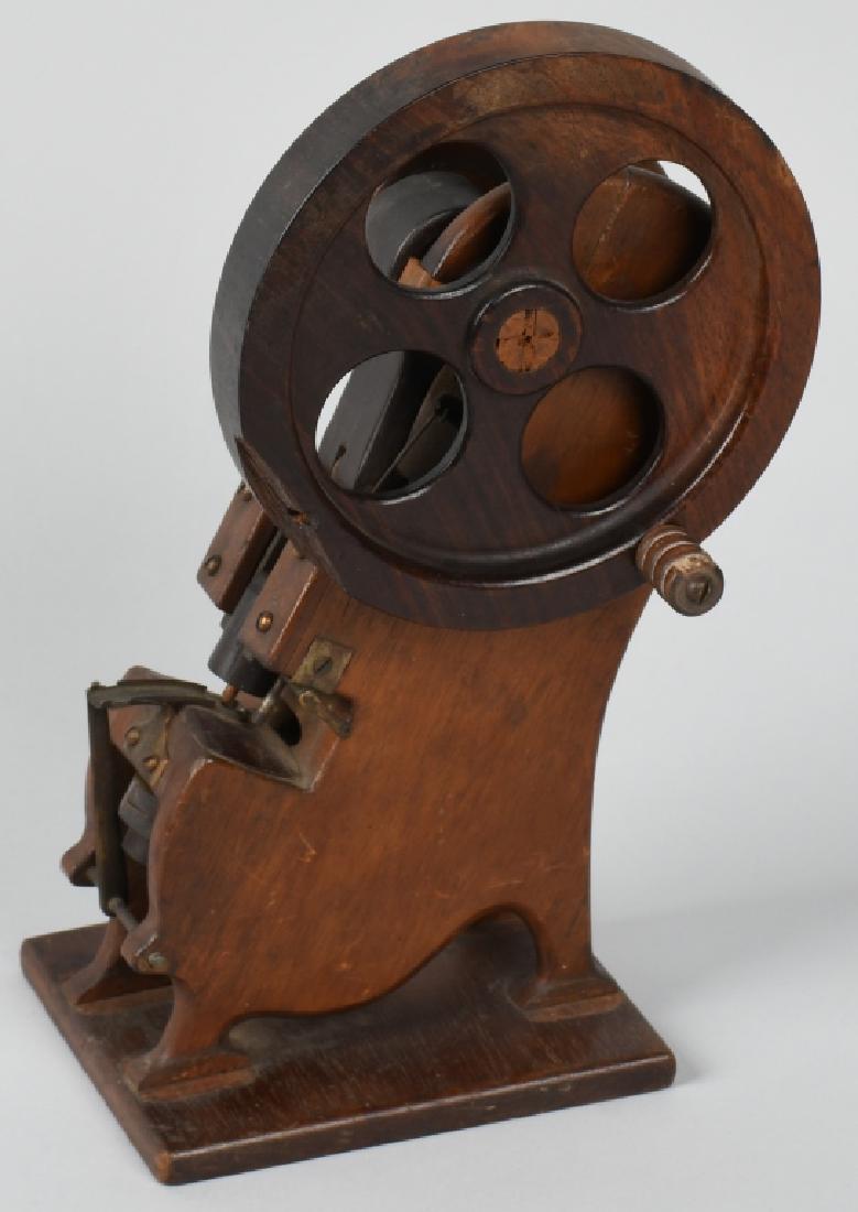 WOODEN PATENT MODEL FOR EARLY STAMPING MACHINE: early wooden patent model for Stamping Machine. All original. Very well made. 11 1/2" Excellent