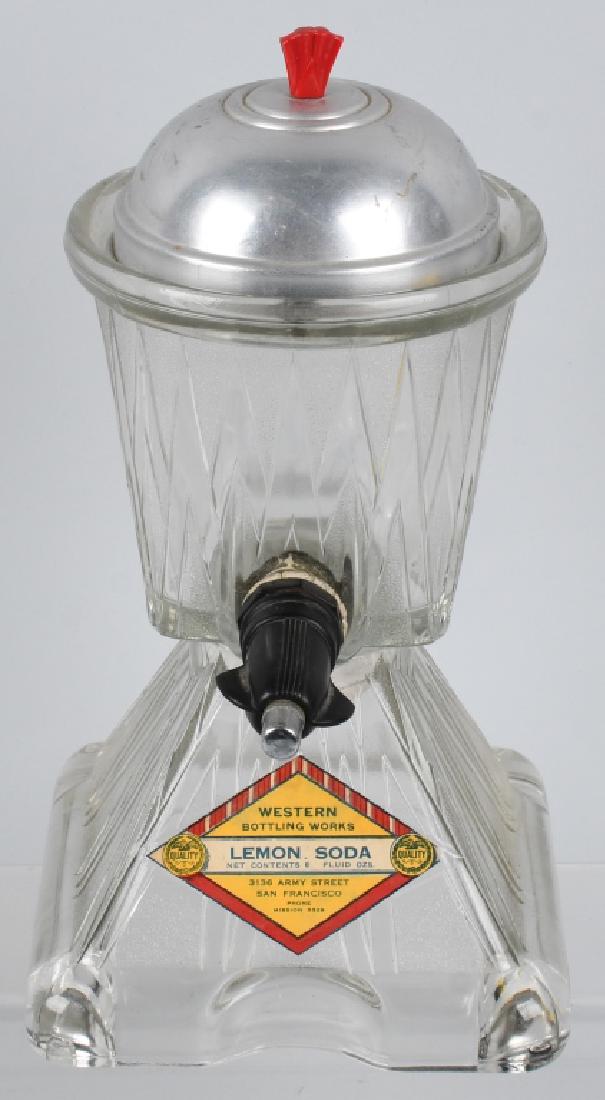 VINTAGE LENON SODA SYRUP DISPENSER: Original Soda Fountain Lemon Soda Syrup Dispenser. All glass construction. Has original top. Decals great shape. 13" Excellent