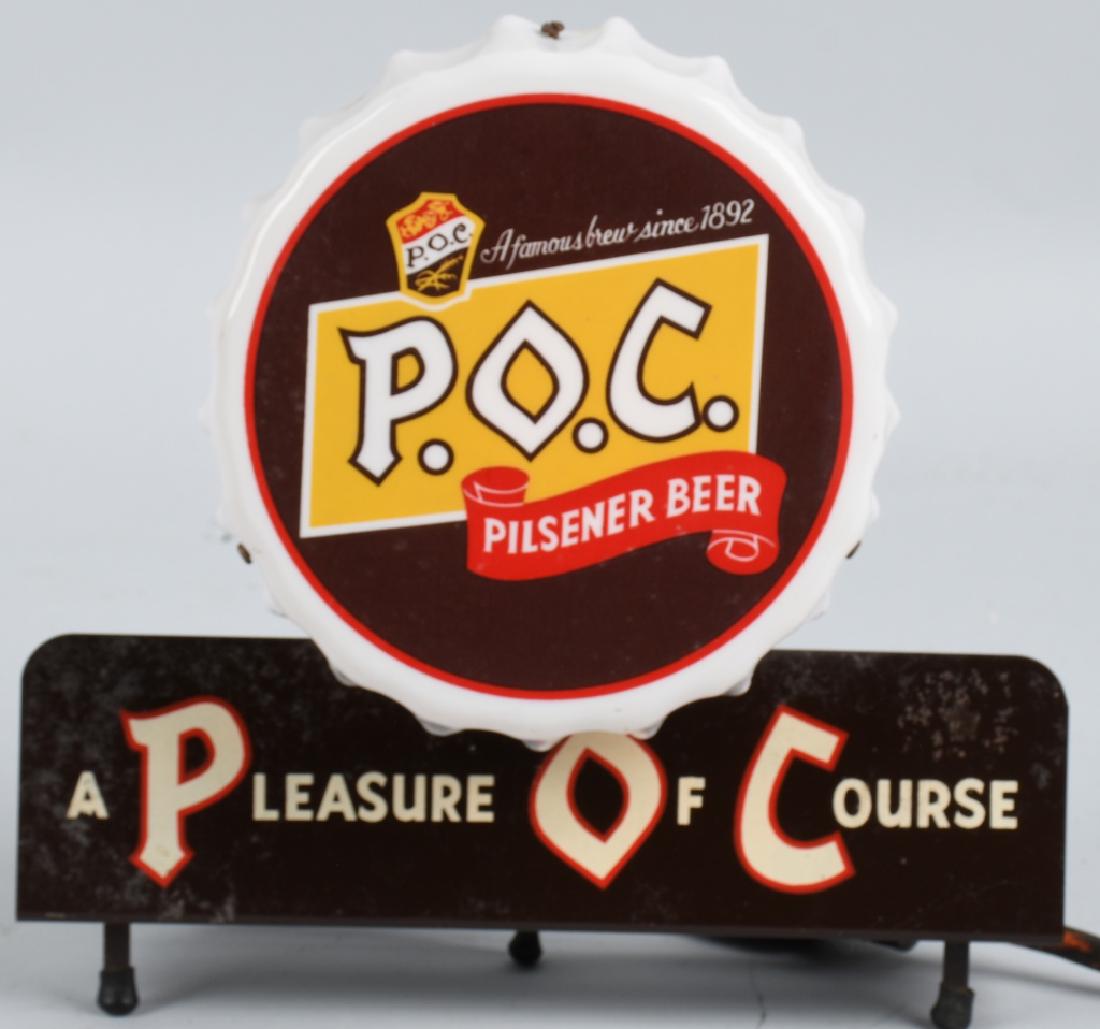 P.O.C. BEER LIGHTED CASH REGISTER SIGN: P.O.C. Beer lighted Cash Register Sign. All original Bottle Cap style. Works well. Has some roughness to finish but displays very well. Brewed in Cleveland, Ohio. 10"x8" Very Good-Excellent