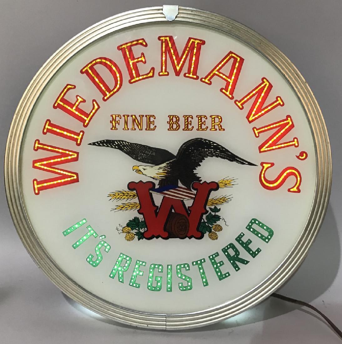 WIEDMANN'S BEER LIGHTED MOTION SIGN: Nice Wiedmann's Fine Beer lighted Motion Sign. All original with great colors and Bald Eagle. Can be hung or sat on a counter. Works perfect. Wiedmanns was brewed in Newport, New Jersey. 15" Excellent