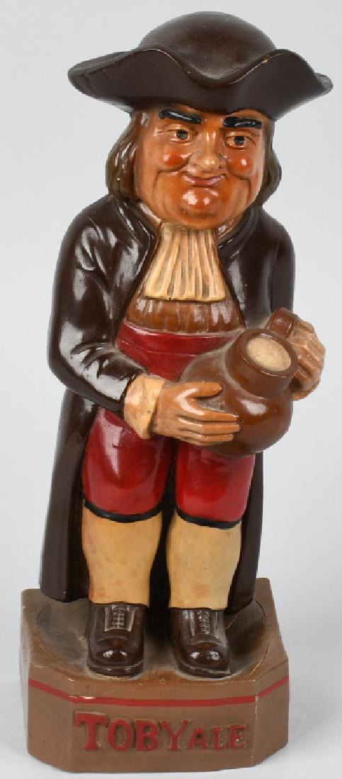 TOBY ALE ADVERTISING FIGURE: Original Toby Ale rubber Advertising Figure. Very nice colors. Has small split on base. Still displays very well. Toby Ale was brewed in London, England. 13 1/2" Very Good-Excellent