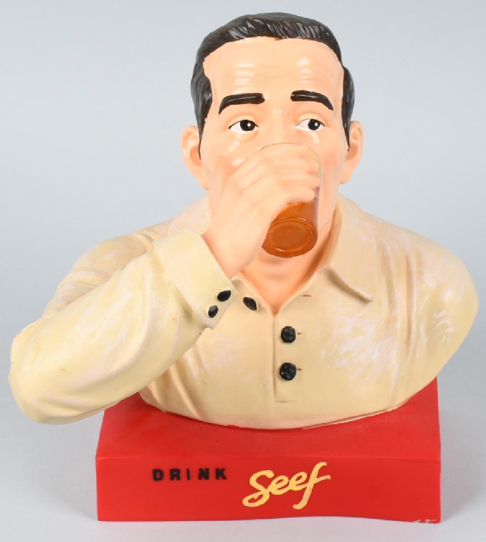 SEEF BEER FIGUARAL ADVERTISING FIGURE: Drink Seef Beer resin Figural Advertising Figure. Gentleman drinking a glass of Seefs. Brewed in Antwerpen. 12" Excellent