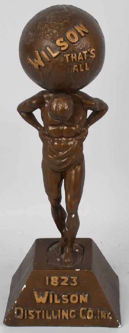 WILSON DISTILLING Co. ATLAS & GLOBE STORE DISPLAY: Art Deco advertising chalk store display, probably 1930's, shows the Greek God Atlas with a globe on his shoulders with the company name and slogan on the globe: "Wilson, That's All." The base reads "