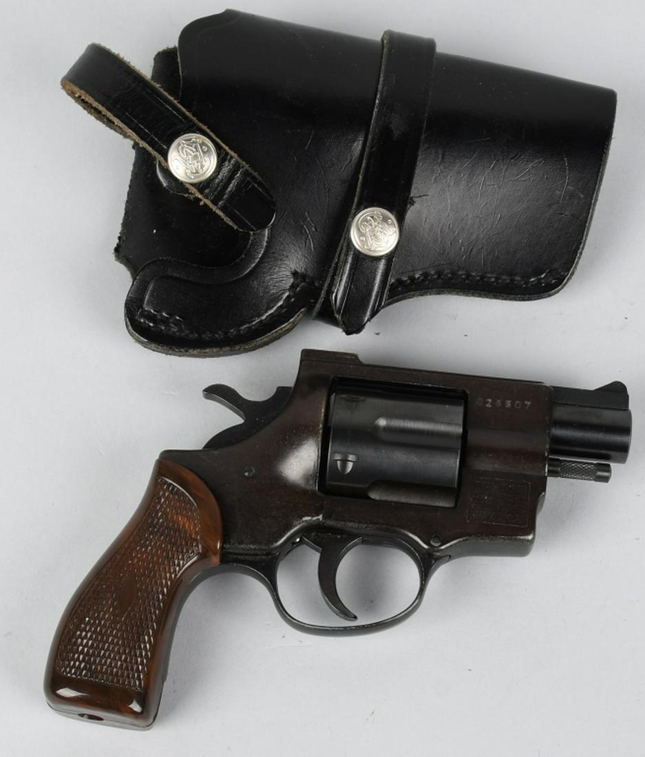 FIE TITAN TIGER 38 SNUB NOSE REVOLVER: SN 028607. 2" barrel, 6-shot double action revolver in .38. FIE / Arminius Titan Tiger snub nose. Features checkered plastic grips, fixed sights, and blued finish. Action very good, indexes well, but 