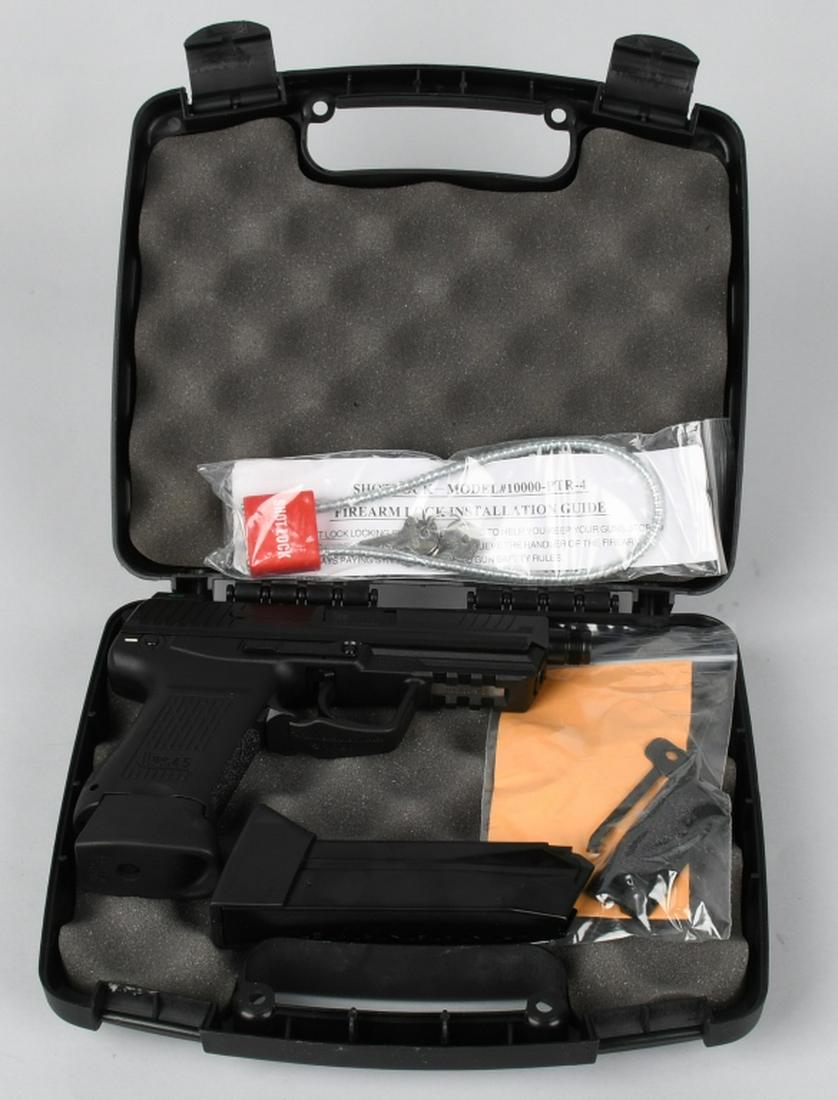 HECKLER & KOCH 45 COMPAT TACTICAL SEMI AUTO PISTOL: SN 216-007260. 4.5" barrel semi automatic pistol in .45 ACP. H&K 45C Compact Tactical. Features threaded barrel, safety / decocker, polymer frame, and comes in original HK black hard plastic box with 