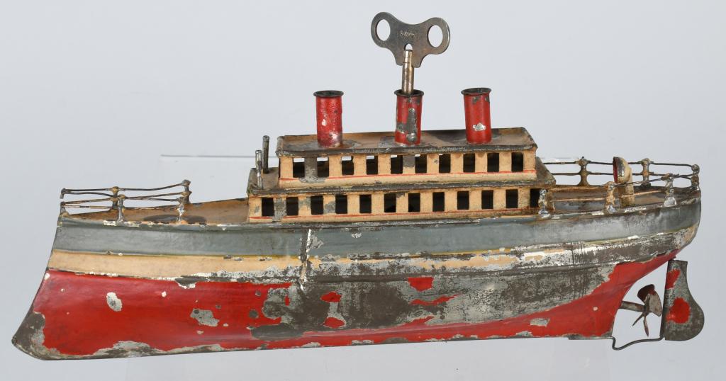 12" GERMAN Tin Windup OCEANLINER: All original as found condition. Has some paint loss. Windup works. Nice looking early German Oceanliner. 12" Very Good