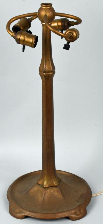TIFFANY STUDIOS GOLD DORE ART NOUVEAU LAMP BASE: Tiffany Studios Art Nouveau Stick Lamp Base. Gold Dore Art Nouveau Stick Lamp Base. Nice patina. 4 sockets. Marked Tiffany Studios New York 531 on bottom. 23 1/2" Excellent