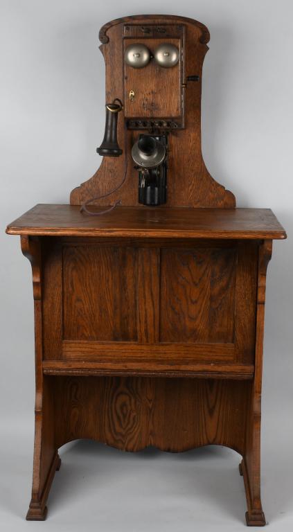 1890s WESTERN ELECTRIC OAK VANITY: Original Western Electric Oak Vanity. Nice oak finish. Has forked receiver hook. Knurled nut is dated Feb 23, 1892. 26" wide x 51" High. Excellent