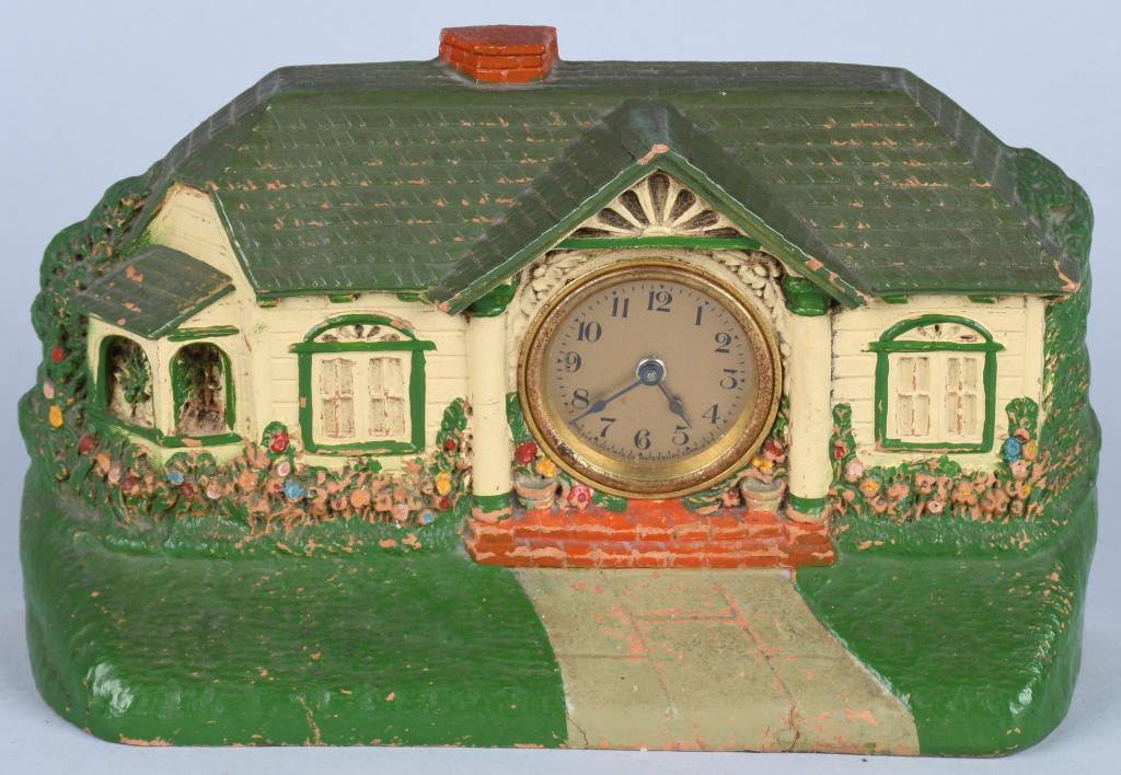 DELUXE CLOCK CO. BUNGALOW CLOCK: Attractive hand painted Bungalow clock, made by the Deluxe Clock & MFG Co. New York. Seems to be over wound. 9 3/4" by 5 1/2". Excellent
