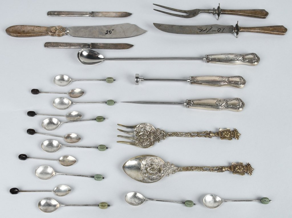 ESTATE SILVER LOT, STERLING & MORE: Lot includes a heavy silver Italian silver serving spoon and fork, several silver handled utensils, and 12 spoon spoons. Excellent
