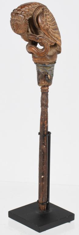 SOUTH SUMATRA CARVED KERIS KRIS HANDLE ca 18-19th: South Sumatra 18th -19th Century A rare and intricately carved Kris (keris) carved Horn Handle Depicting a bird perched upon an integral base, dramatically grasping a writhing snake in its talons and 