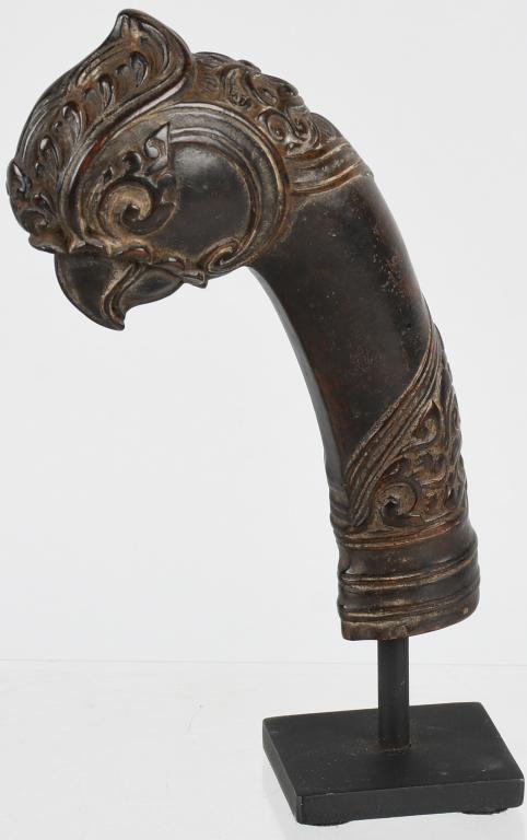 MALAYSIA HULU SWORD HILT ca 19th C: Malasia, Hulu Burung Serindit 19th Century Wood Sword Handle having a elaborately carved Geruda Head Finial with a Makura Dragon Head on back & Floral design below Provenance: Ex- private collection o