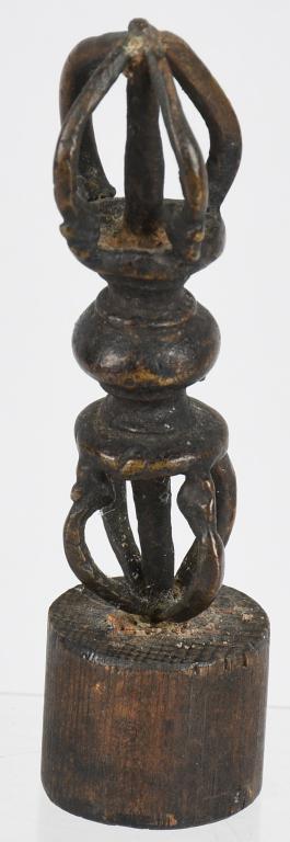 18th C TIBETAN BRONZE DORJE VAJRA: Central Asia, Tibet, ca. 18th to 19th century CE. A nice example of a cast bronze dorje (vajra), in the form of two openwork, cage-like spheres at either end, joined together below two bases for each 