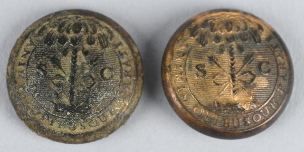 2-CONFEDERATE DUG SOUTH CAROLINA VEST BUTTONS: Nice pair of dug Confederate South Carolina vest buttons that measure 11/16". Both have Scoville & Co Waterbury Back marks and one is RMDC. Missing shanks. Faces are nice with traces of original gold 