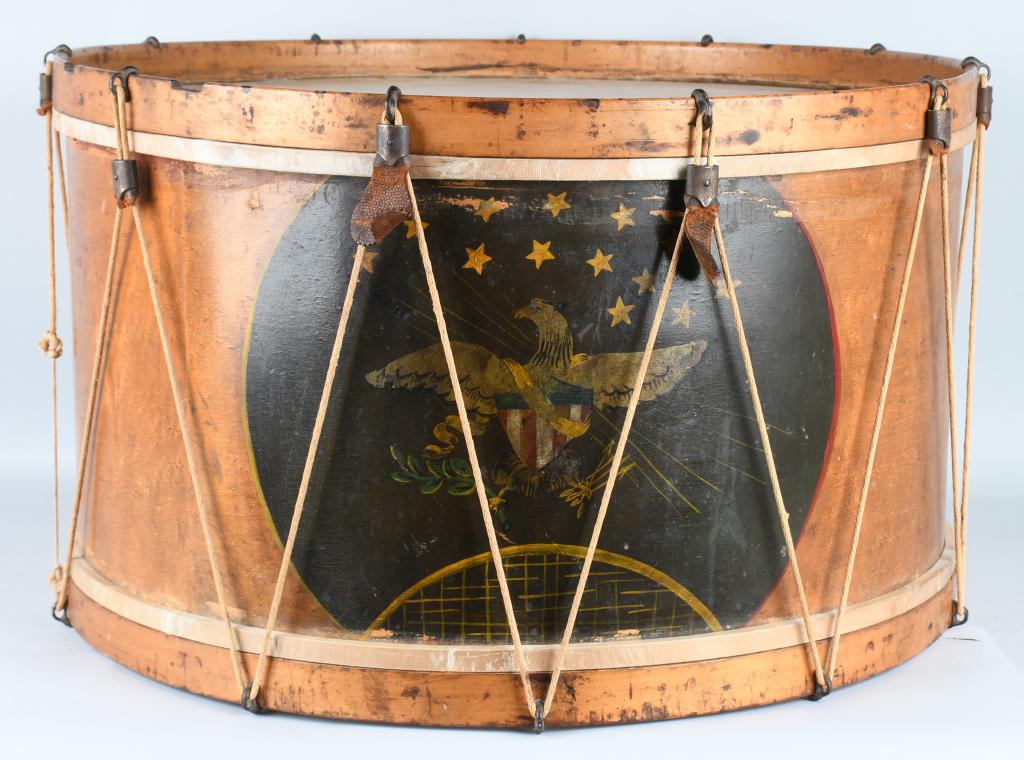 CIVIL WAR ERA PAINTED EAGLE BASS DRUM: Beautiful Civil War era bass drum with painted Federal Eagle with shield at breast and 13 stars in the field above. Has iron rope hooks and 7 iron and leather tensioners. The leather is missing on 4 o