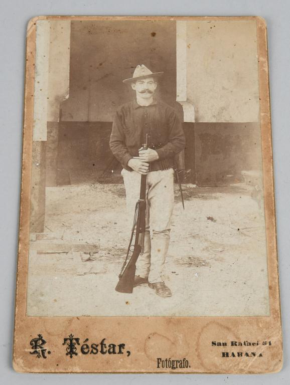 SPAN AM WAR 8th INFANRY CABINET CARD PHOTO ID'd: Identified Spanish American War cabinet card photograph depicting a soldier wearing Mills belt with Krag bayonet affixed to it, wearing a Model 1899 Campaign cap, field uniform, and holding a Krag rif