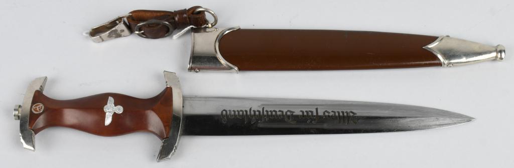 WWII NAZI GERMAN M33 SA DAGGER BY ROBERT KLASS: This SA Dagger is a very nice example with a nickel plated tang nut and guards. The plating remains bright throughout. The grip is a nice example being a typical RZM type with a high center ridge. It 