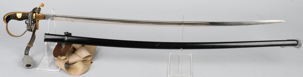 WWII NAZI GERMAN EM/NCO SWORD BY ALCOSO W/ HANGER: (Säbel) Roughly, 32 inch long slightly curved steel construction blade. Blade is in near mint condition. The saber has brass hilt fittings with a "P" knuckle bow. Original grip wire is still present.